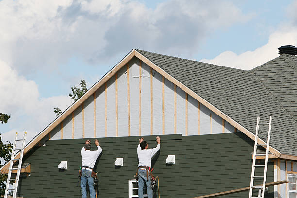 Professional Siding technician working in Monessen, PA